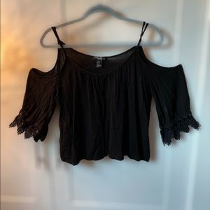 Cold shoulder blouse.